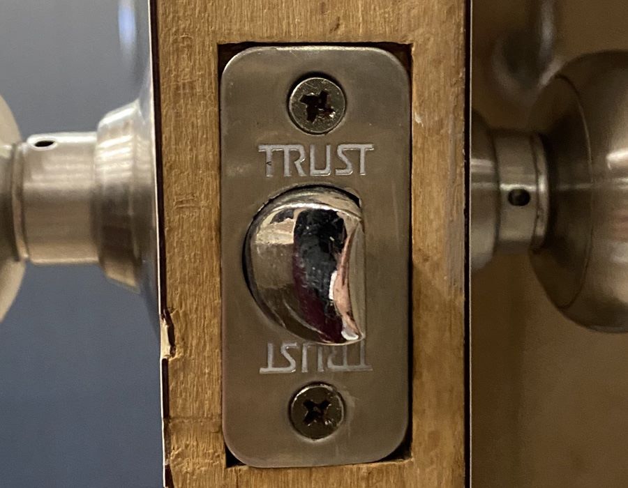 The Door Handle Said "TRUST"